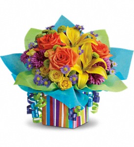 Teleflora's Rainbow Present in Hartley IA, Jackie's Floral Center