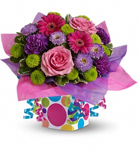 Teleflora's Confetti Present in Hartley IA, Jackie's Floral Center